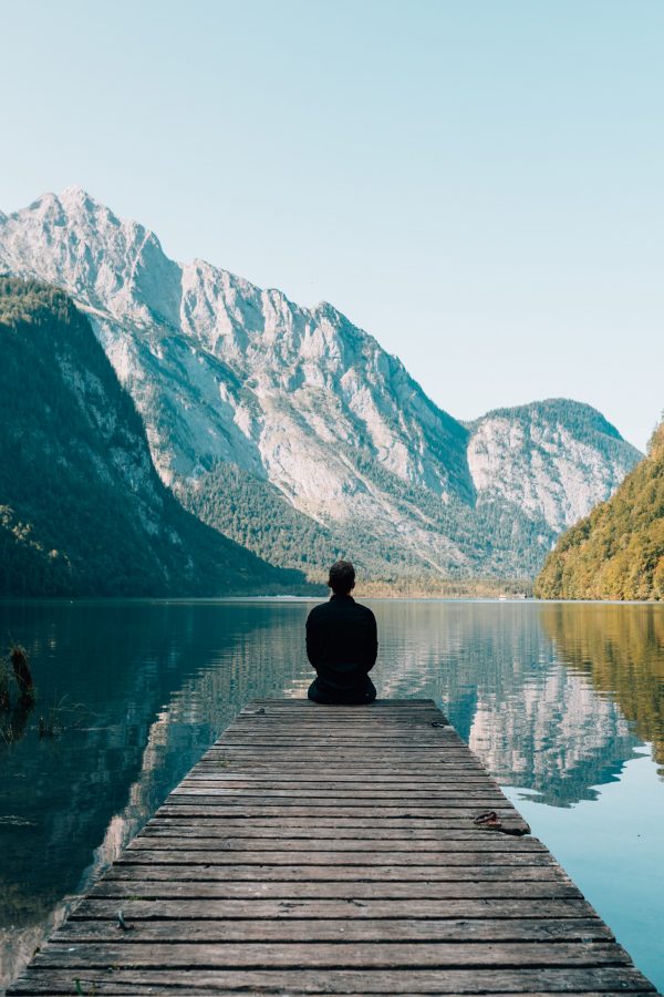 man sitting on warf aware that God is speaking